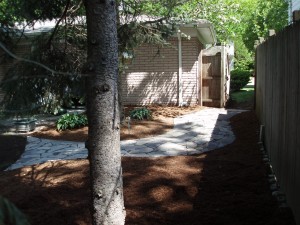 The final flagstone walkway with new double shredded hardwood mulch view 2 Troy, MI